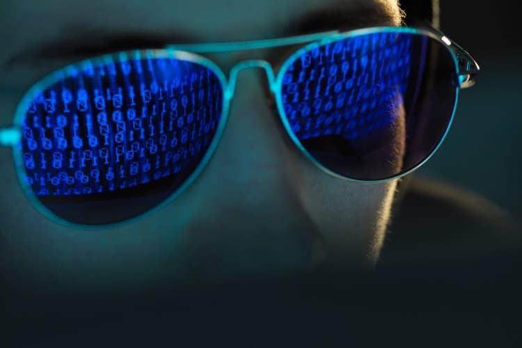 cyber-crime-reflection-in-spectacles-of-virus
